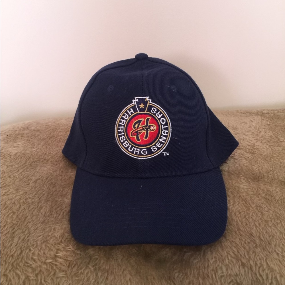 Harrisburg Senators Adjustable
velcro Baseball cap w/ Senators Logo. Never worn